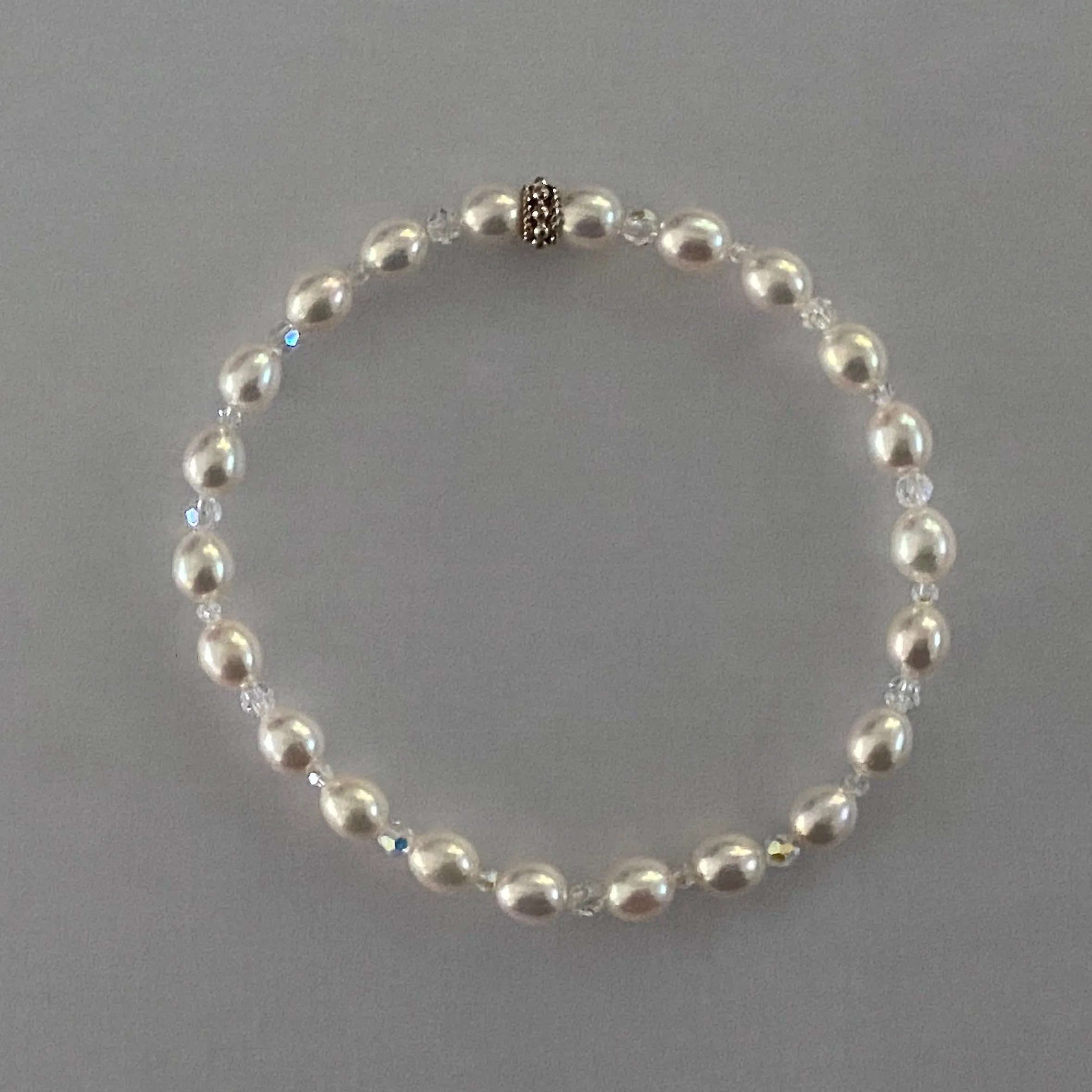 7-1/3" stretch bracelet with soft white freshwater cultured pearls and Swarovski crystal beads