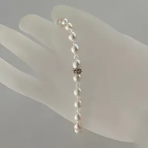 7-1/3" stretch bracelet with soft white freshwater cultured pearls and Swarovski crystal beads