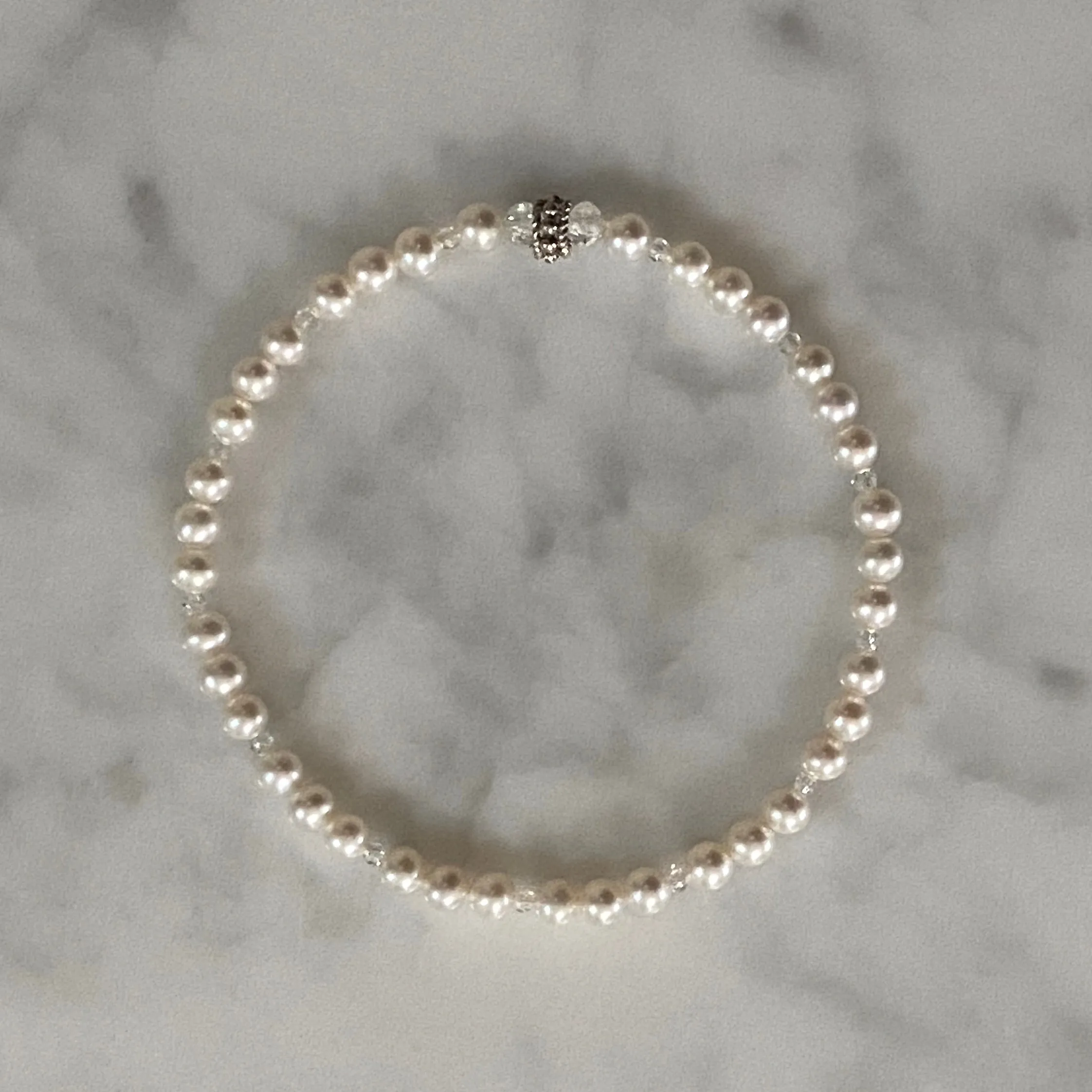 7.25" stretch bracelet with 4-4.5mm round white cultured freshwater pearls & Swarovski crystal