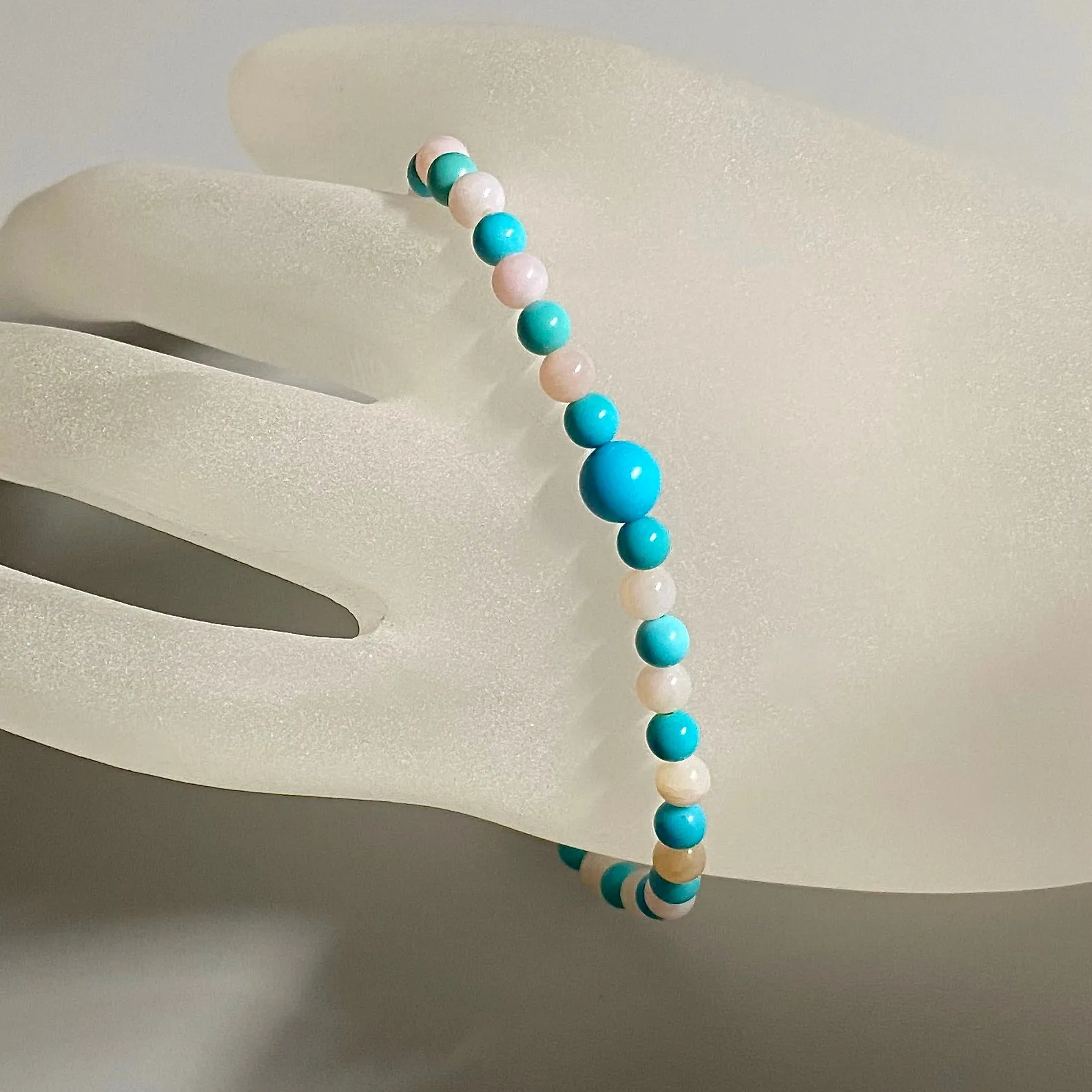 7.5" Stretch Bracelet with Natural Sleeping Beauty Turquoise and Pink Peruvian Opal Beads
