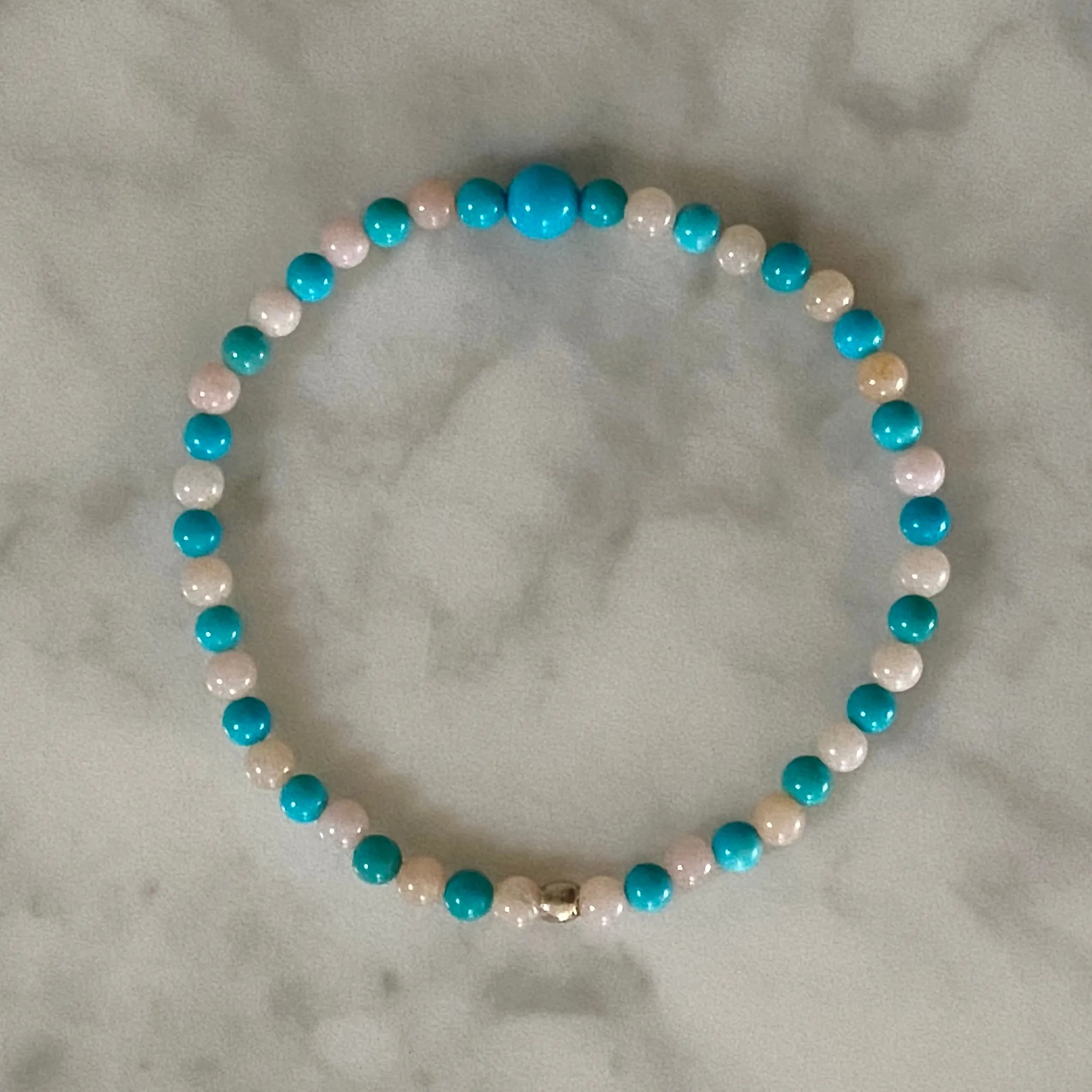 7.5" Stretch Bracelet with Natural Sleeping Beauty Turquoise and Pink Peruvian Opal Beads