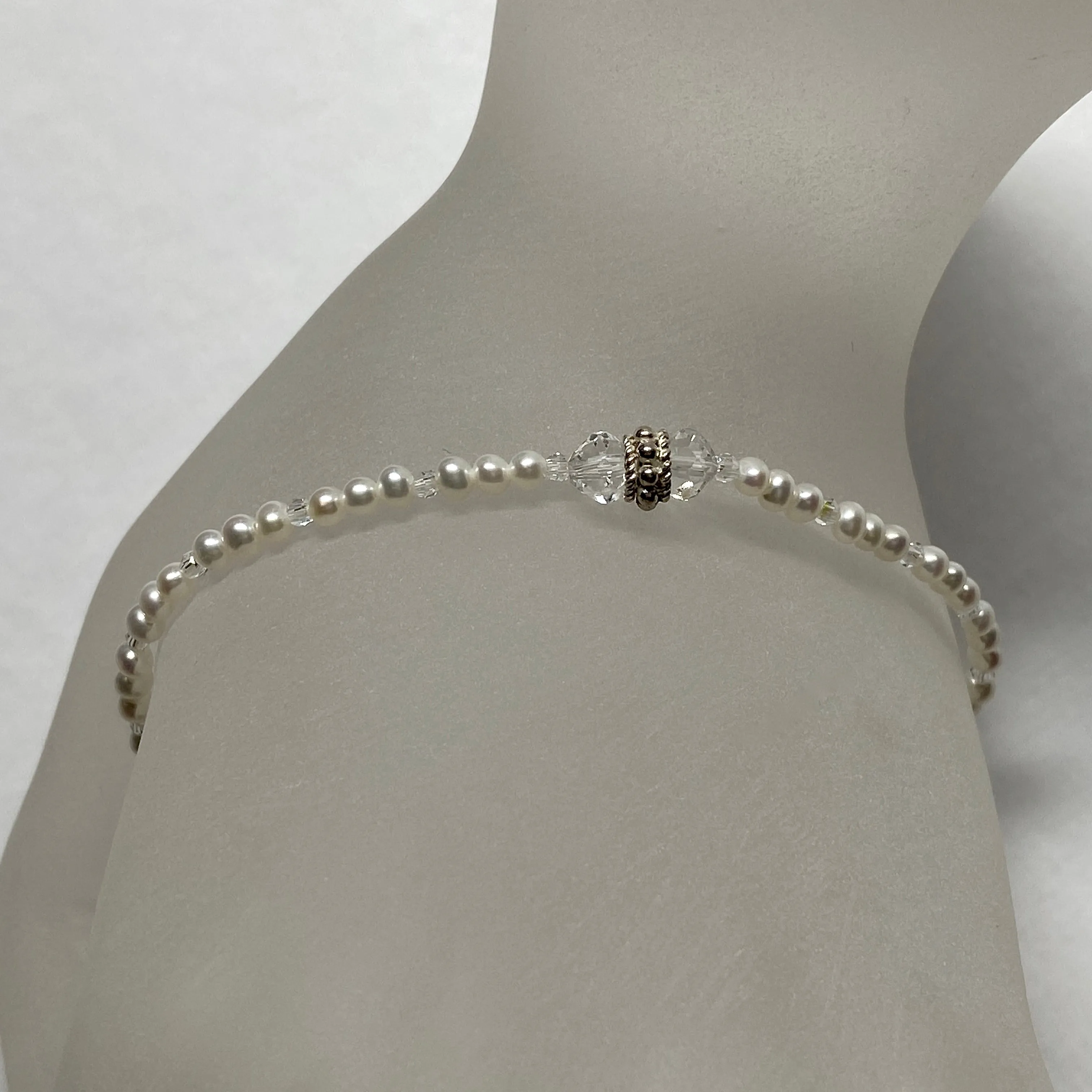 Arpaia 7-1/4" stretch bracelet with white baby freshwater cultured pearls and Swarovski crystal beads
