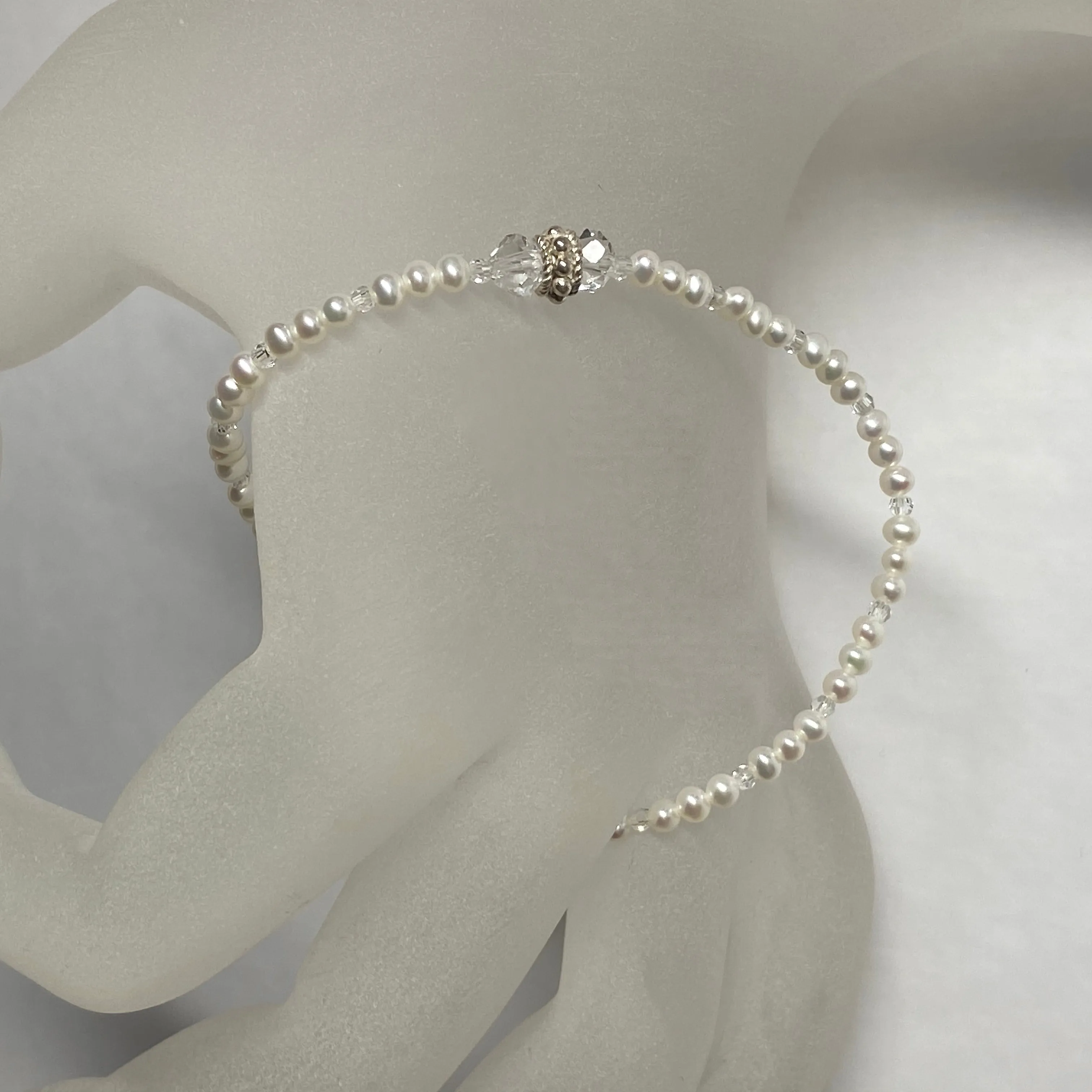 Arpaia 7-1/4" stretch bracelet with white baby freshwater cultured pearls and Swarovski crystal beads