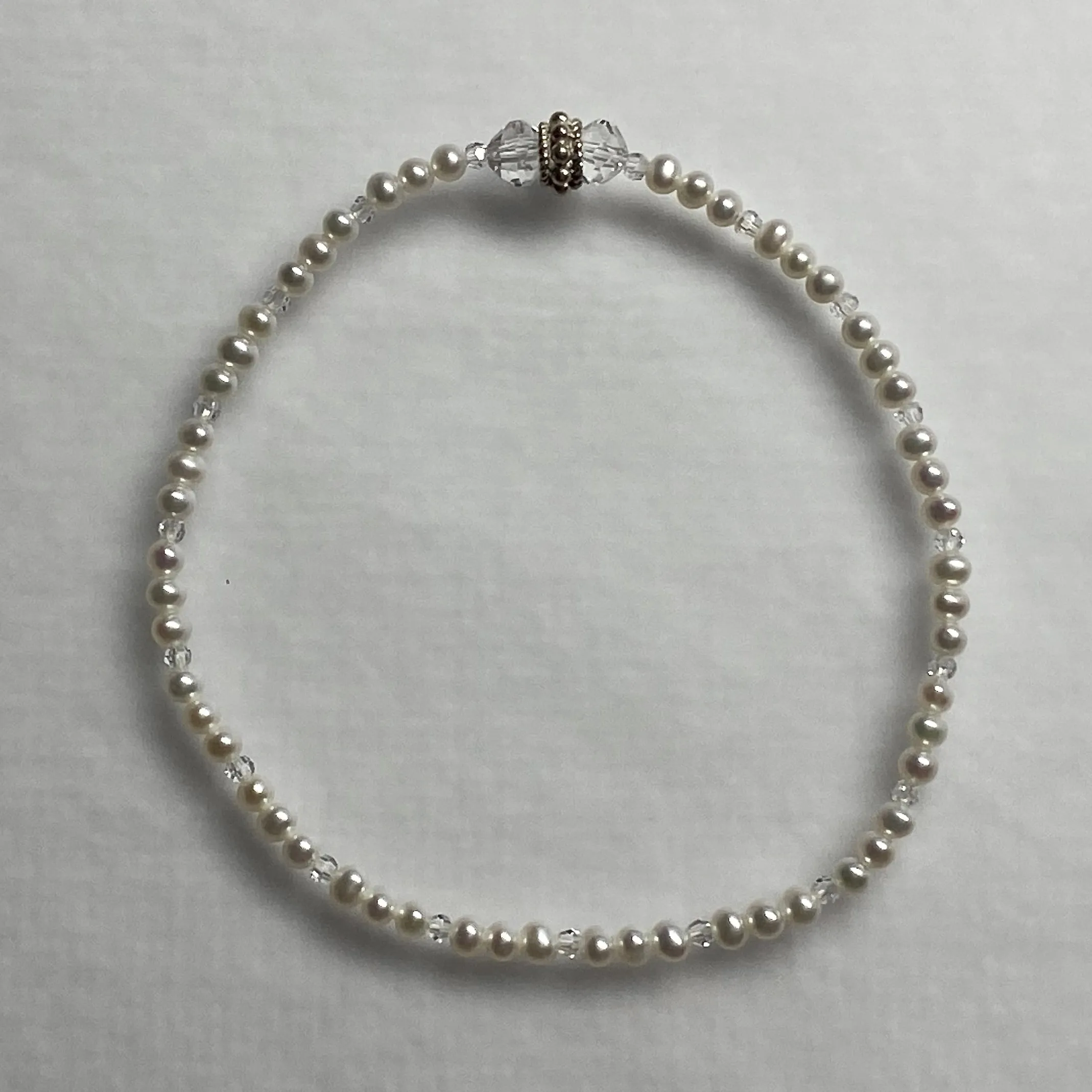 Arpaia 7-1/4" stretch bracelet with white baby freshwater cultured pearls and Swarovski crystal beads