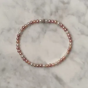 Arpaia 7.25" stretch bracelet with 4-4.5mm white and natural pink and purple cultured freshwater pearls