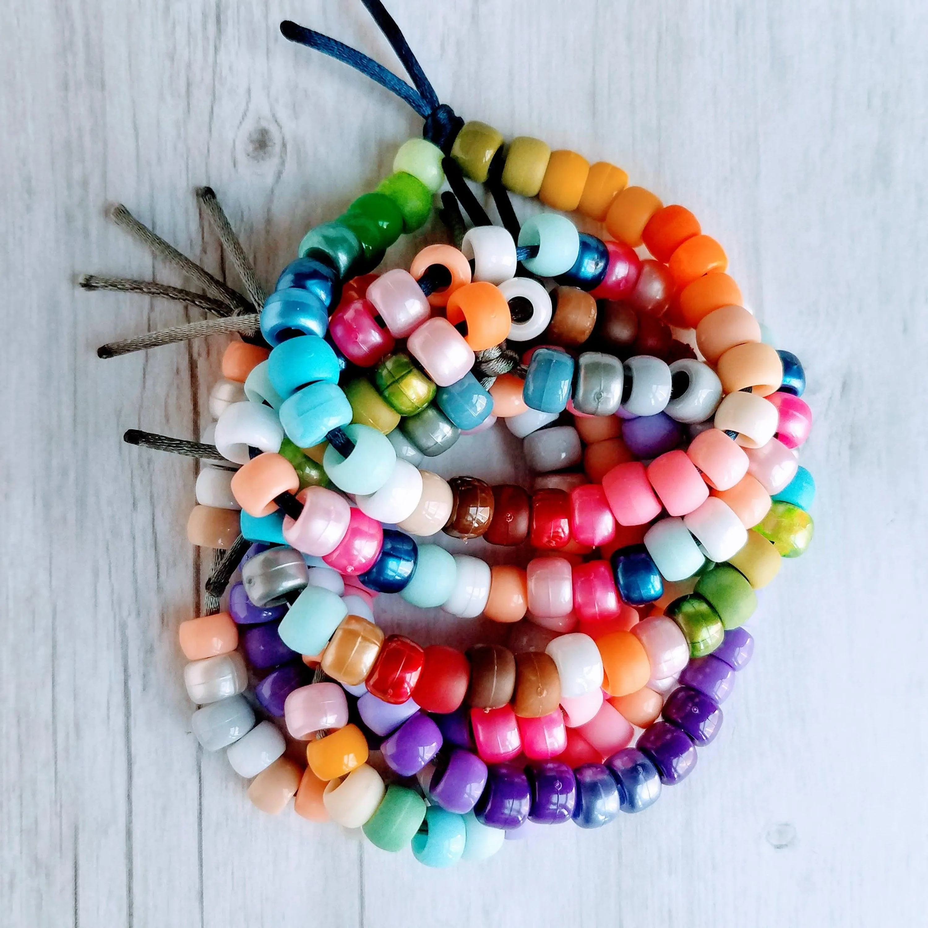 Forte Inspired Glass Bead Bracelet - large chunky pony crow rollers, tan suede style cord, neutral pink, brown grey white, big bead tie on