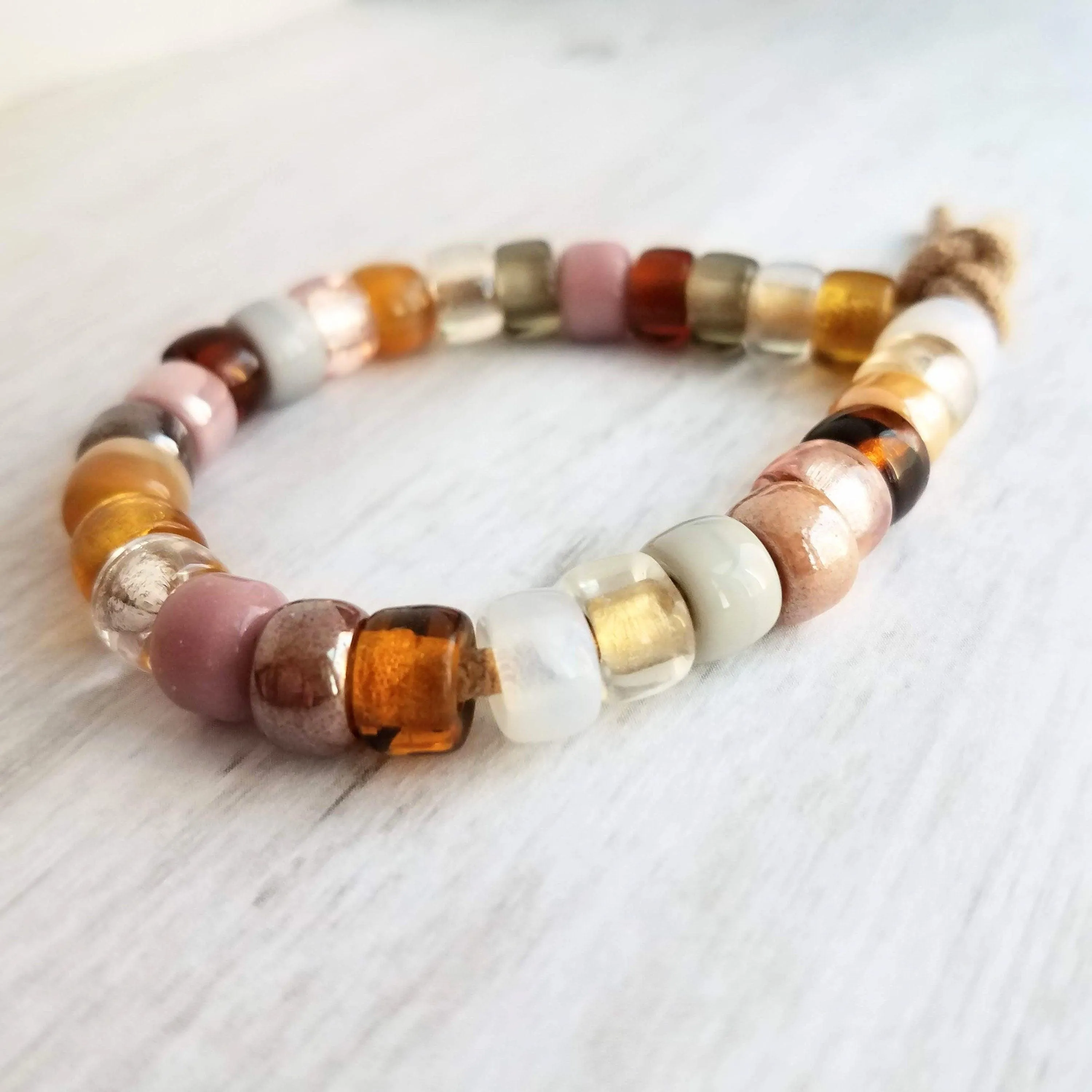 Forte Inspired Glass Bead Bracelet - large chunky pony crow rollers, tan suede style cord, neutral pink, brown grey white, big bead tie on