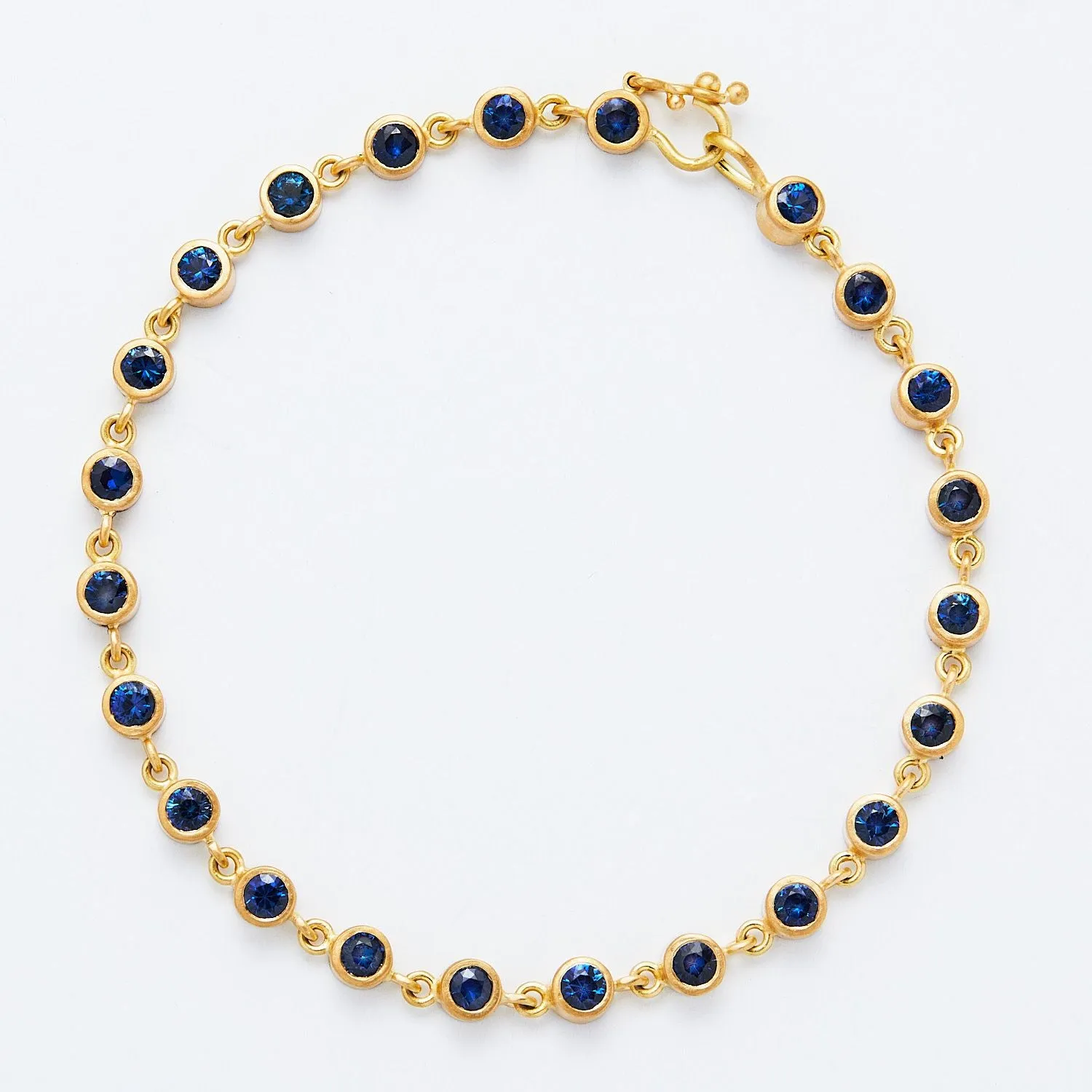 Meadow Rivière Blue Sapphire Bracelet in 20K Peach Gold