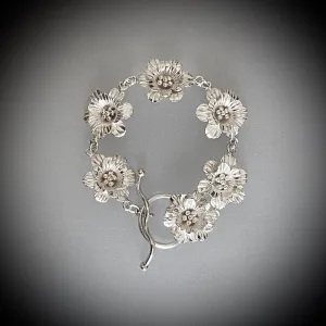 "In Full Bloom" ~ Artisan-Crafted Fine White Silver Floral Link Bracelet with Flower Toggle Clasp ~ 8" Length