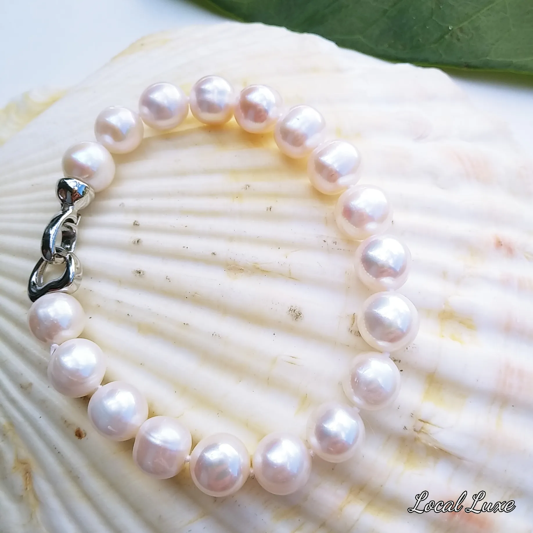 "My Baby Love" - Pearl Bracelet with Decorative Heart Clasp