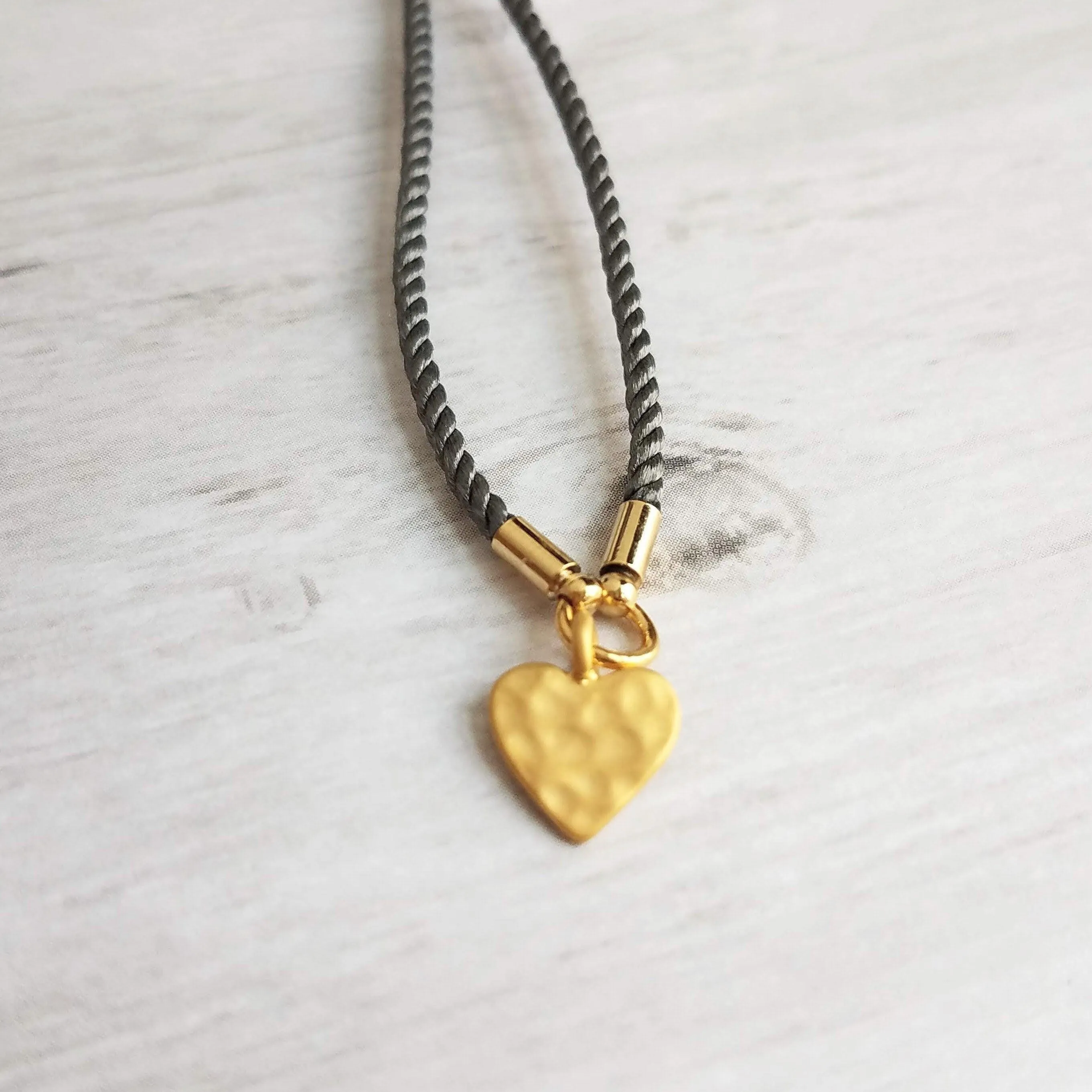 Rope Bracelet, matte gold heart charm, grey twisted cord, thin string, gold medallion, adjustable gray cord silky stacking layering bracelet