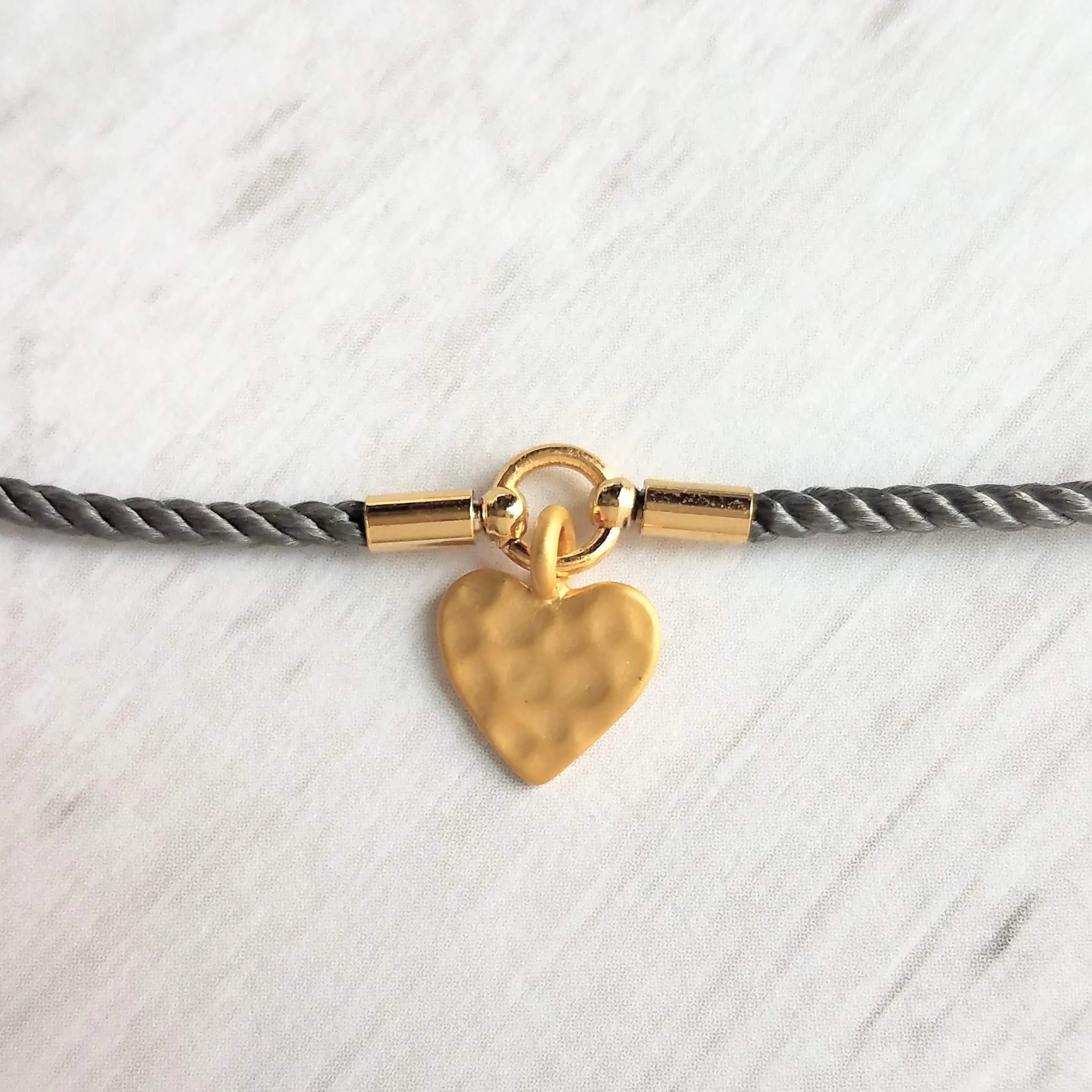 Rope Bracelet, matte gold heart charm, grey twisted cord, thin string, gold medallion, adjustable gray cord silky stacking layering bracelet