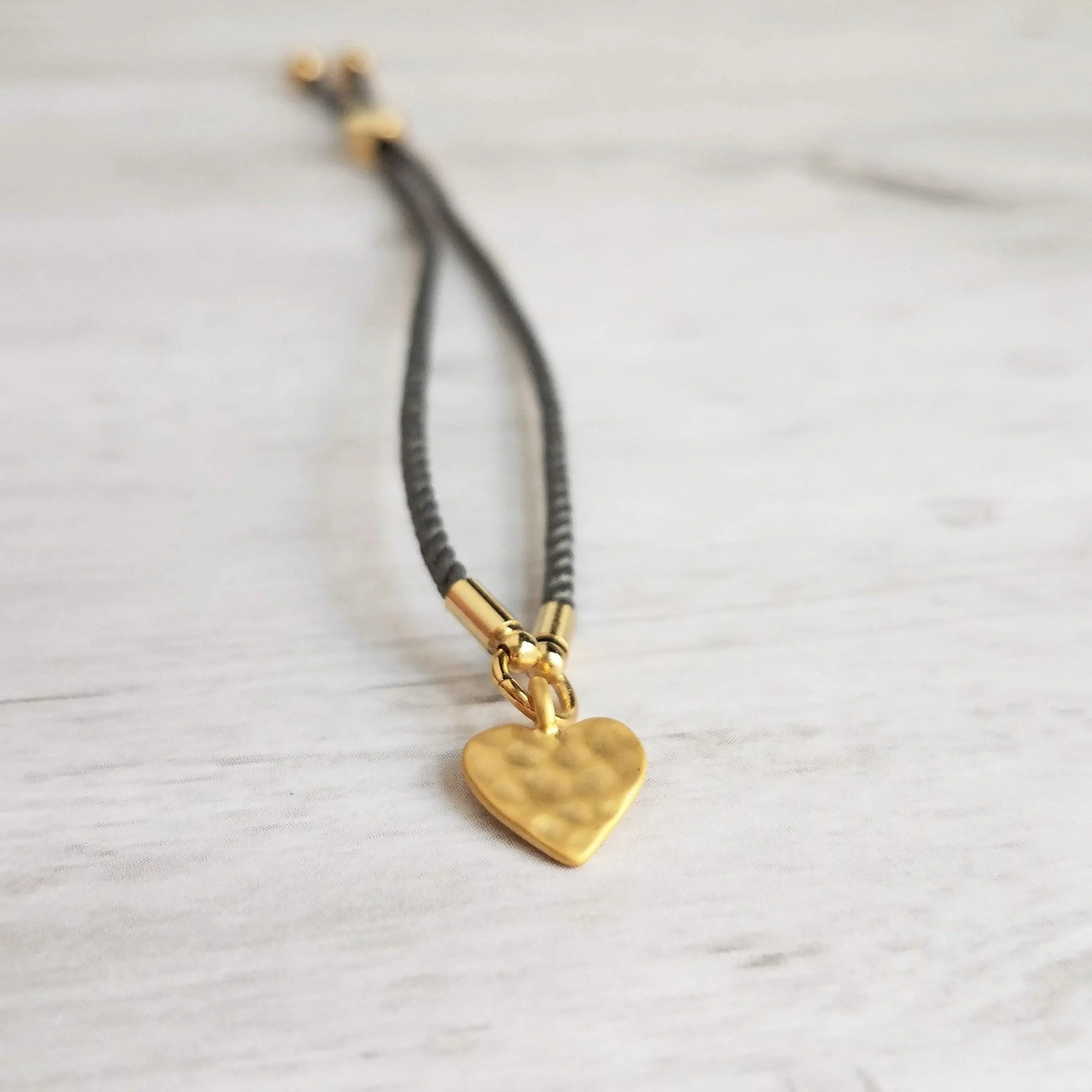 Rope Bracelet, matte gold heart charm, grey twisted cord, thin string, gold medallion, adjustable gray cord silky stacking layering bracelet