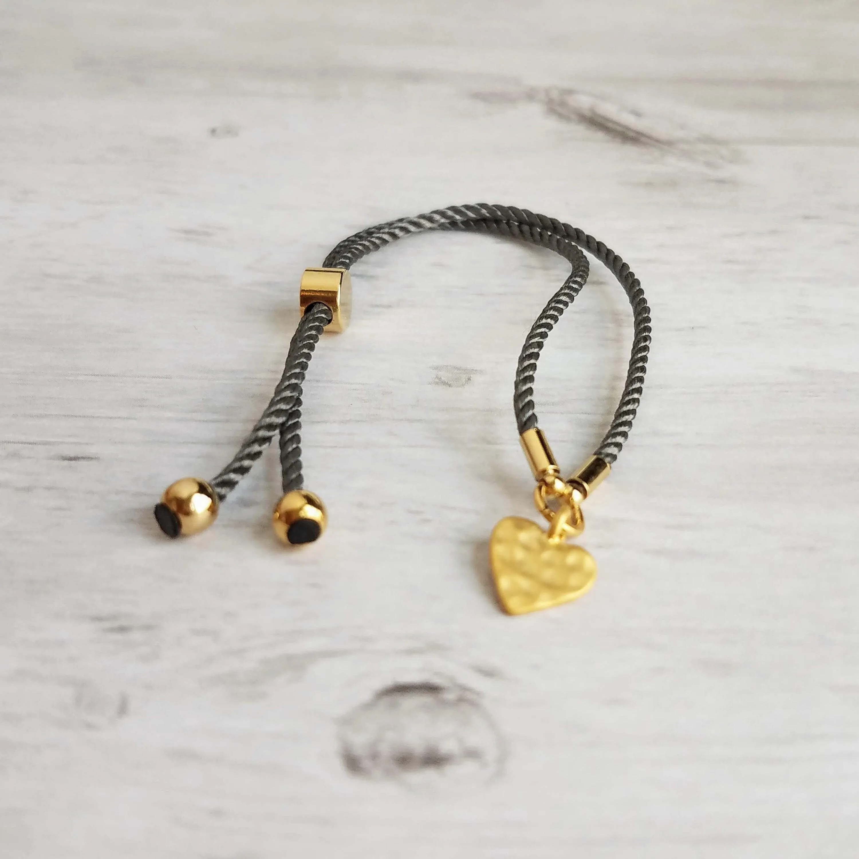 Rope Bracelet, matte gold heart charm, grey twisted cord, thin string, gold medallion, adjustable gray cord silky stacking layering bracelet