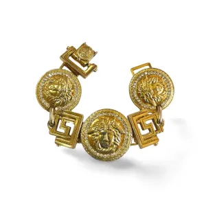 Vintage Gianni Versace gold tone medusa face motif bracelet with crystals. Must have Lady Gaga style jewelry piece. 060308m