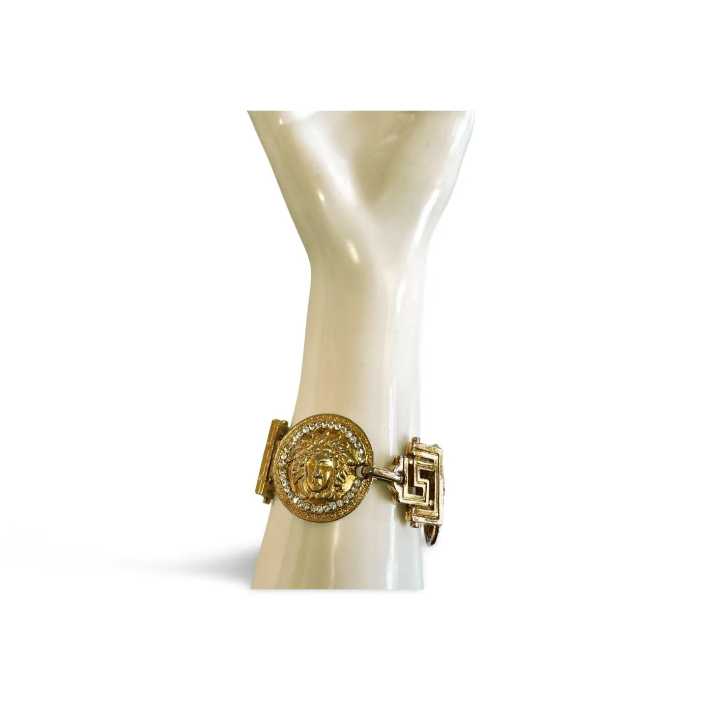 Vintage Gianni Versace gold tone medusa face motif bracelet with crystals. Must have Lady Gaga style jewelry piece. 060308m